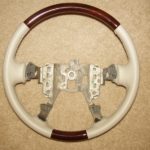 Cadillac steering wheel white vinyl and zebrano