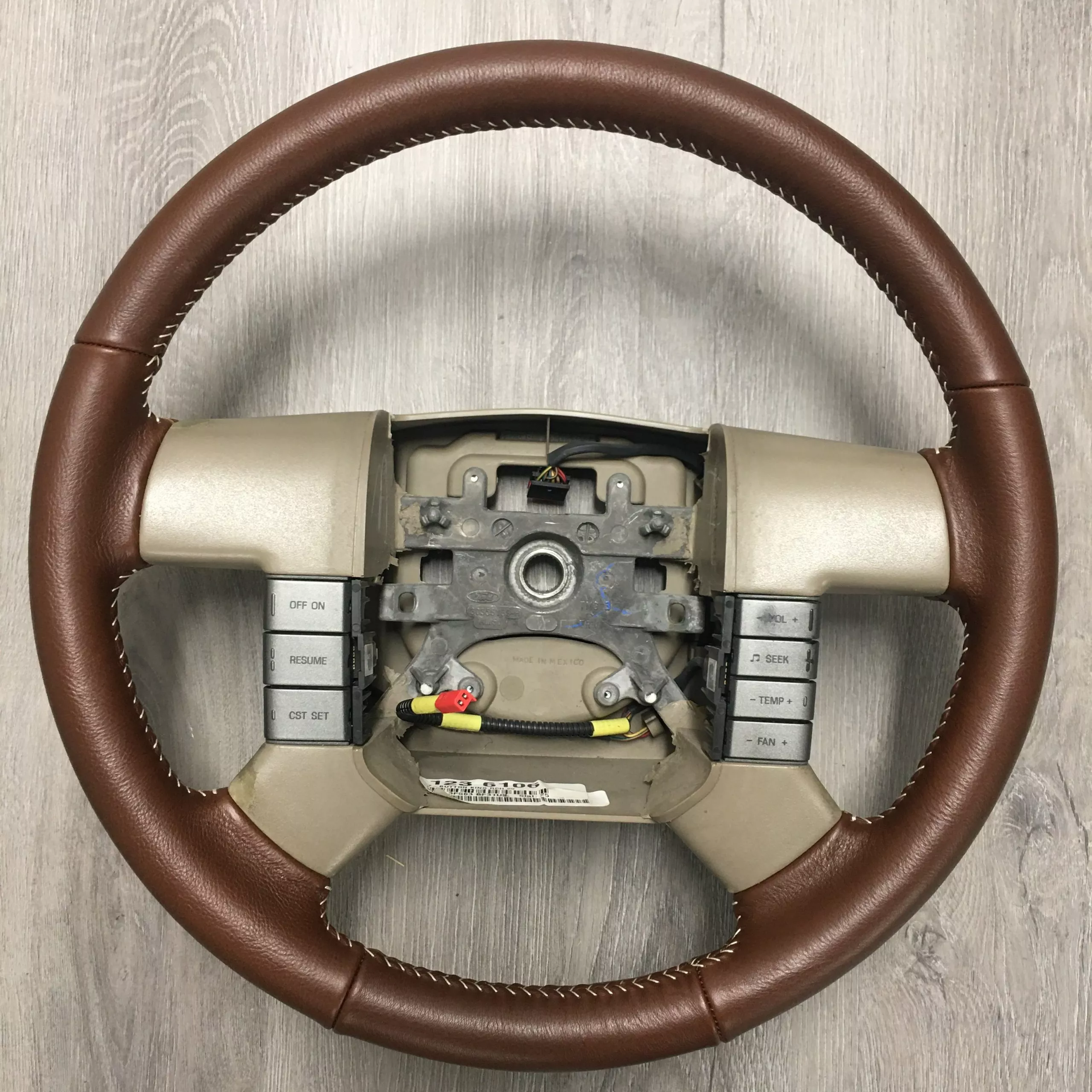 thumbnail image 2 of Genuine Leather Steering Wheel Cover For 2000-2004 Ford Excursion – Tan, 2-Stitch Style With Lacing Cord & Needle 2 of 4