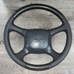 Chevy 2001 Steering Wheel Restored to New Leather and Added Carbon Fiber P0070